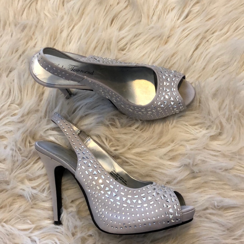 Silver bedazzled peep toes. Worn once!